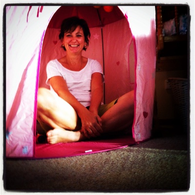 Playing in a friend's princess tent