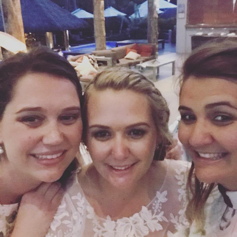Sisters together at the wedding