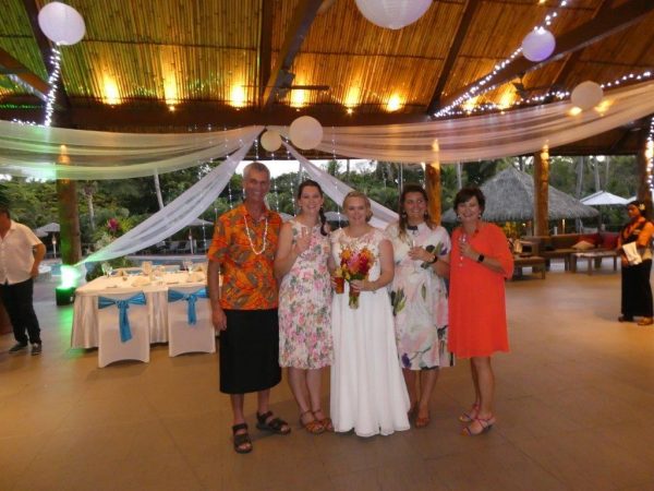 Family photo at daughter's destination wedding in Fiji
