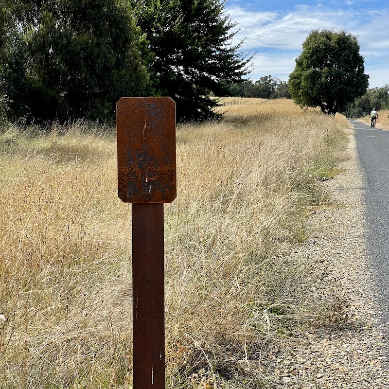three quarter mile marker on rail trail